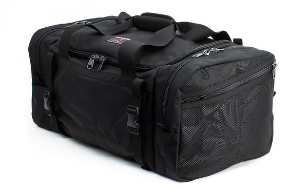 A 3/4 shot of the Road Buddy Duffel 60 showing the lash strap attachment points and Mesh Side Pocket.